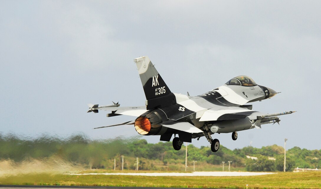 During Cope North, an F-16 "Aggressor" Fighting Falcon takes off Feb. 12, 2010, at Andersen Air Force Base, Guam. The U. S. Air Force and the Japan Air Self-Defense Force conduct Cope North annually at Andersen AFB to increase combat readiness and interoperability.  The aircraft is assigned to the 18th Aggressor Squadron at Eielson AFB, Alaska. (U.S. Air Force photo/Staff Sgt. Andy M. Kin)