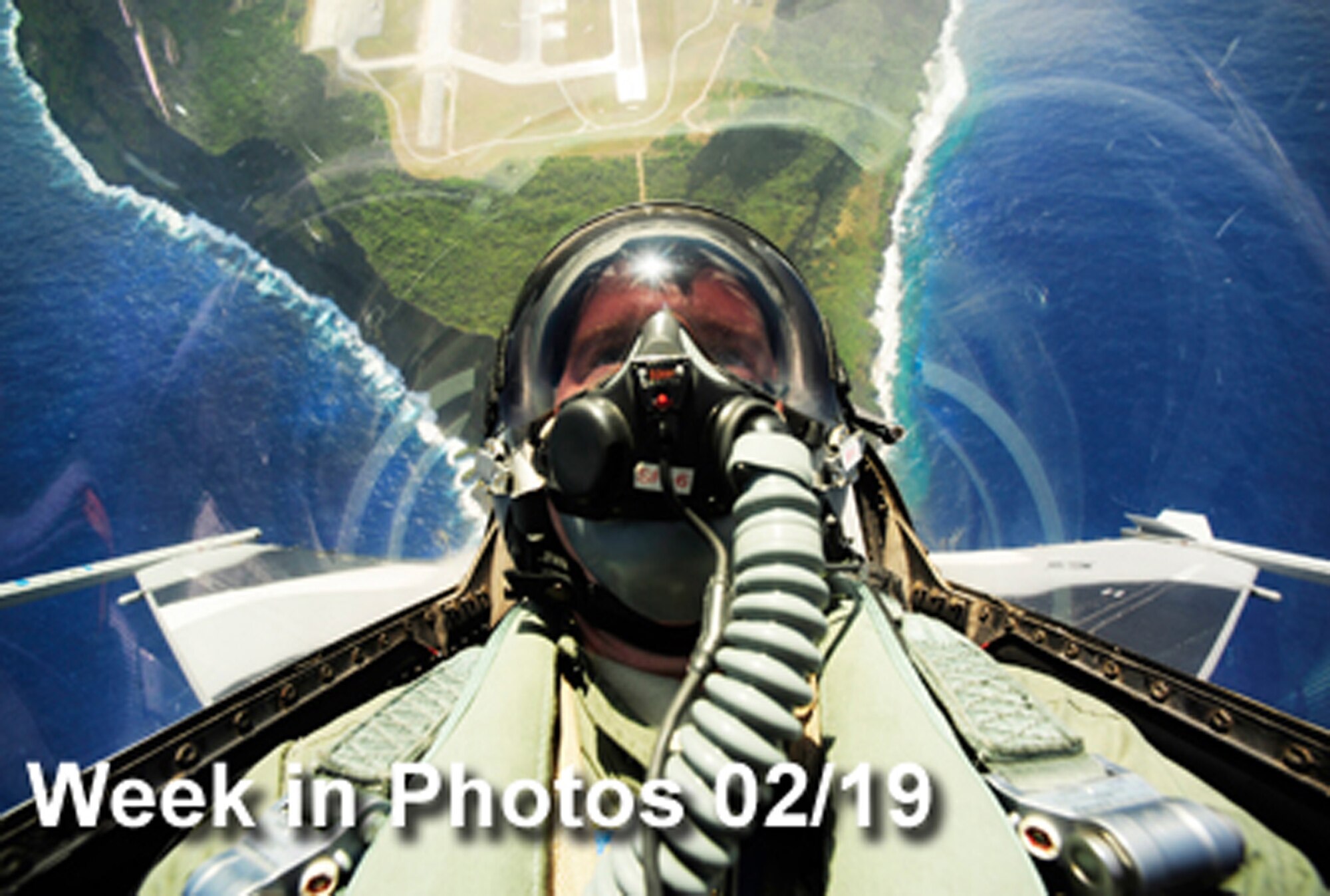 Air Force Week in Photos for Feb. 19, 2010, highlights photos from around the Air Force. In this photo by Staff Sgt. Jacob N. Bailey, an F-16 Fighting Falcon pilot conducts an unrestricted vertical climb from Andersen Air Force Base, Guam, during Exercise Cope North. (U.S. Air Force illustration)