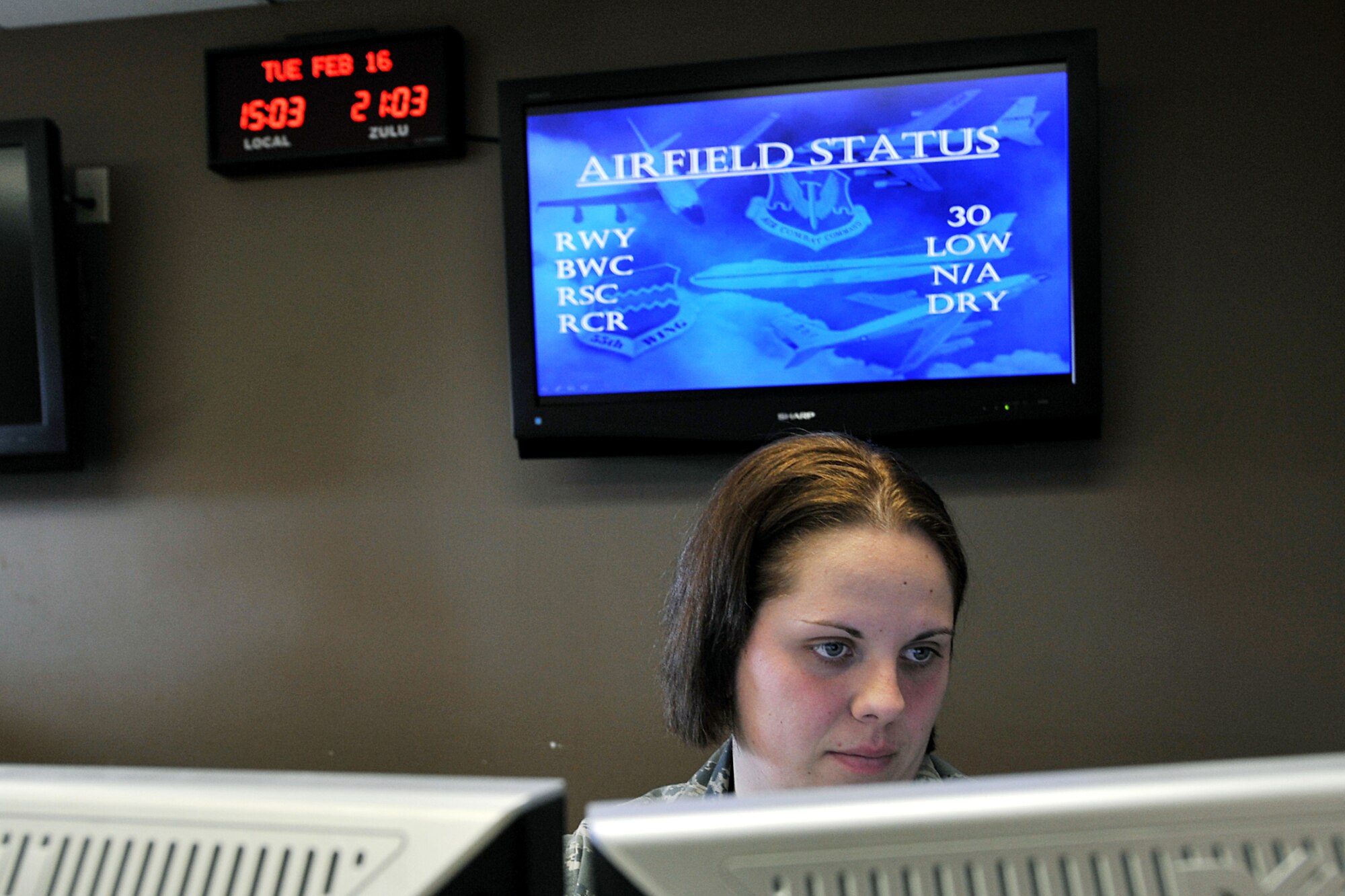 OFFUTT AIR FORCE BASE, Neb. - Staff Sgt. Savanna Layton, with the 55th Operations Support Squadron, checks the schedule for incoming aircraft at base operations Feb. 16. The Airfield Operations Flight airfield management team coordinates with various base agencies to provide a safe environment for aircraft operations. 

U.S. Air Force photo by Charles Haymond