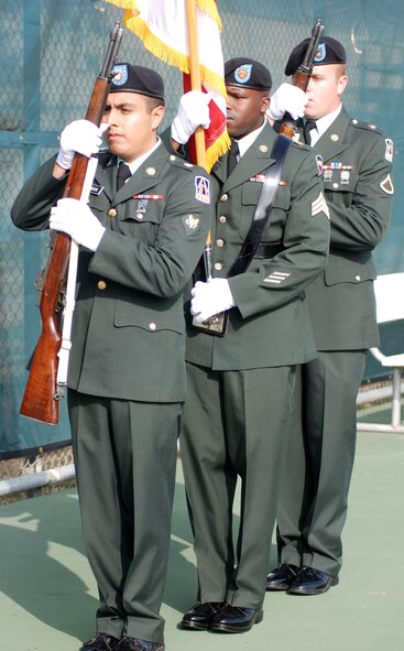 Members of an Army Reserve Honor Guard practice with the Blue Eagles Total Force Honor Guard at March Air Reserve Base, Calif., Feb. 12. The Honor Guard rehearsed a full funeral detail, including flag folding, pallbearing and a firing squad.  (U.S. Air Force photo/Staff Sgt. Megan Crusher)