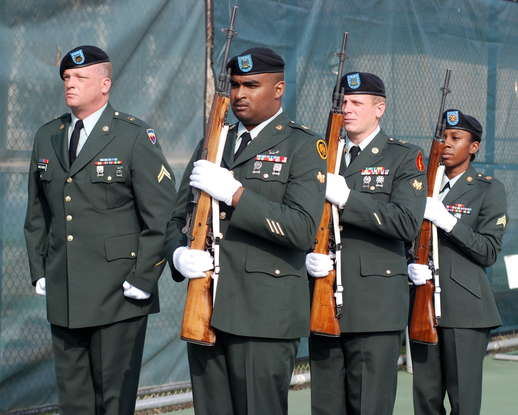 Members of an Army Reserve Honor Guard practice with the Blue Eagles Total Force Honor Guard at March Air Reserve Base, Calif., Feb. 12. The Honor Guard rehearsed a full funeral detail, including flag folding, pallbearing and a firing squad.  (U.S. Air Force photo/Staff Sgt. Megan Crusher)