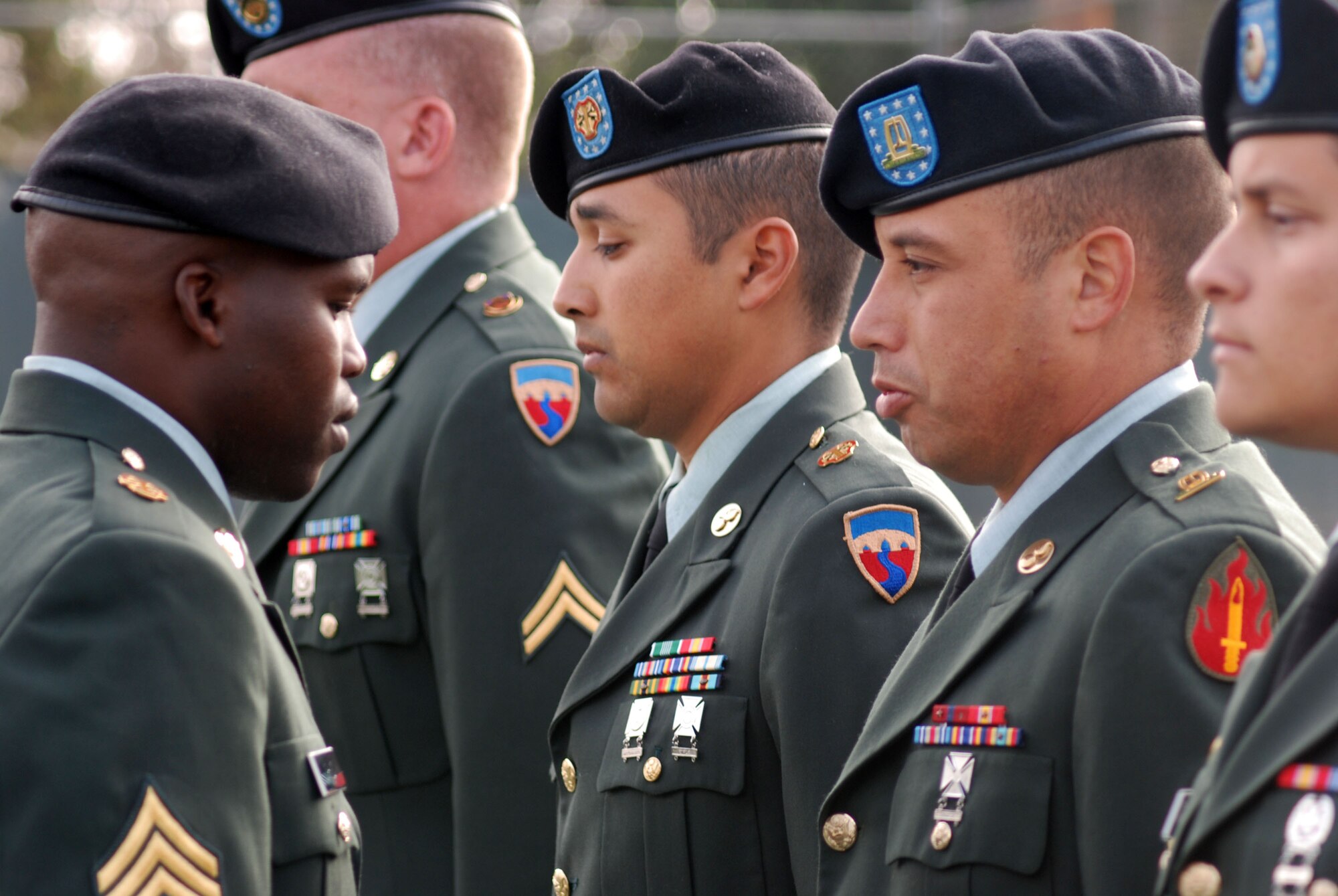 Members of an Army Reserve Honor Guard practice with the Blue Eagles Total Force Honor Guard at March Air Reserve Base, Calif., Feb. 12. The Honor Guard rehearsed a full funeral detail, including flag folding, pallbearing and a firing squad.  (U.S. Air Force photo/Staff Sgt. Megan Crusher)