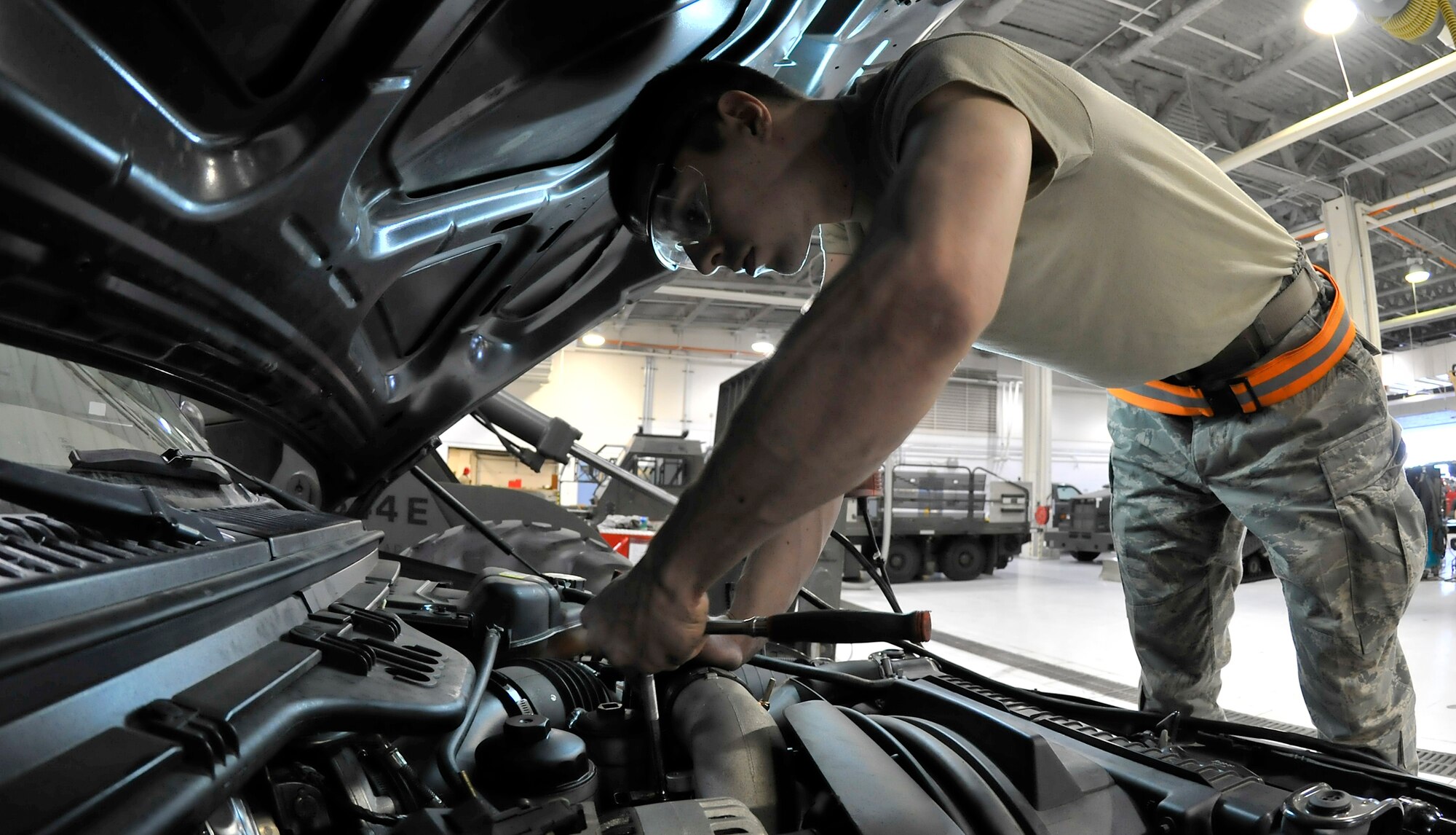Senior Airman Rex Russell removes an EGR valve for cleaning Feb. 17, 2010, Eielson Air Force Base, Alaska. The EGR valve helps the engine run efficiently. Airman Russell is a mechanic assigned to the 354th Logistics Readiness Squadron. (U.S. Air Force photo/Staff Sgt. Christopher Boitz)