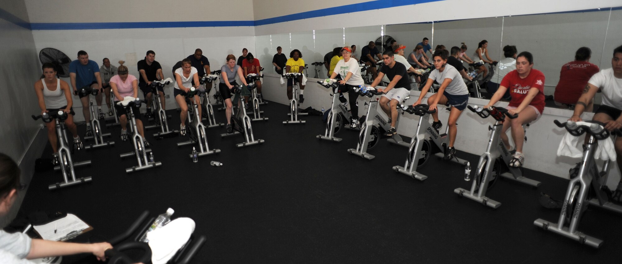 A Wednesday Hump Day Spin-A-Thon took place Feb.17 at Cannon Air Force Base, N.M., to give individuals an opportunity to push themselves physically by cycling as hard as they could during a two-hour period.  Participants received a T-shirt for their sweat and efforts. (U.S. Air Force Photo by Senior Airman Evelyn Chavez)