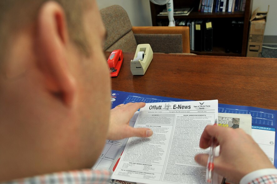 OFFUTT AIR FORCE BASE, Neb. - Ryan Hansen, a member of the 55th Wing Public Affairs office, corrects the Offutt E-News Feb. 17 before it's sent electronically to Team Offutt members. The PA office uses various channels of communication to inform the Offutt community of events and issues at the base such as severe weather. 

U.S. Air Force photo by Charles Haymond