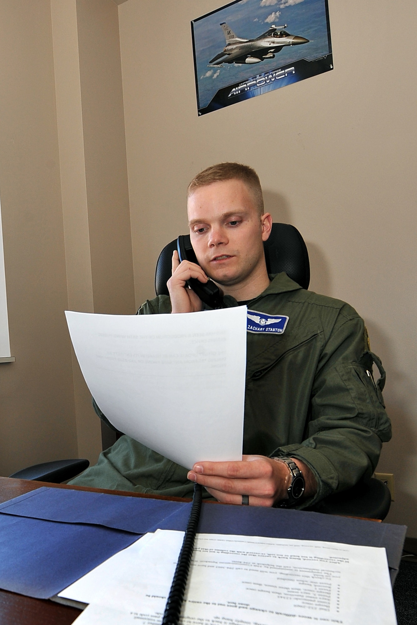 OFFUTT AIR FORCE BASE, Neb. - Senior Airman Zach Stanton, public affairs augmentee assigned to the 338th Combat Training Squadron, records the Offutt Update telephone information system Feb. 17. The PA office uses various channels of communication to inform the Team Offutt community of event and issues at the base such as severe weather. 

U.S. Air Force photo by Charles Haymond