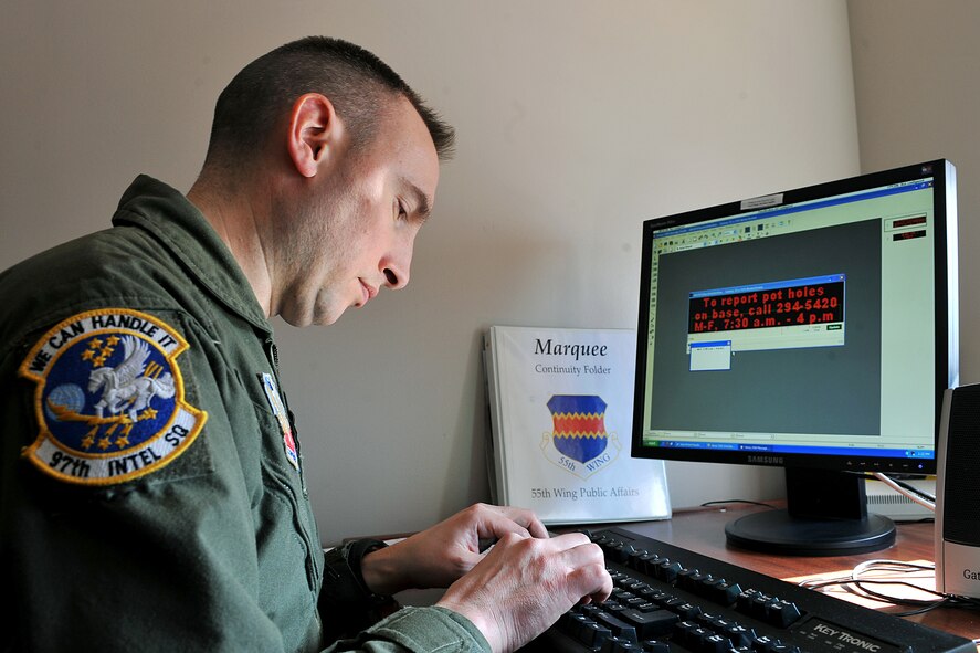 OFFUTT AIR FORCE BASE, Neb. - Staff Sgt. Matt Opdyke, public affairs augmentee assigned to the 97th Intelligence Squadron, updates marquee electronic billboards Feb. 17. The PA office uses various channels of communication to inform the Team Offutt community of event and issues at the base such as severe weather. 

U.S. Air Force photo by Charles Haymond