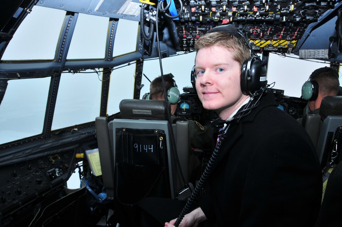 Steve Whipple representing Congressman Chris Lee?s office sits in the flight engineers seat during  the 914th Airlift Wing sponsored Congressional Breakfast, February 18, 2010, Niagara Falls Air Reserve Station, Niagara Falls, NY. Mr. Whipple was given an operations brief and C-130 orientation flight during a crew training mission over the Niagara region. (U.S. Air Force photo/ Staff Sgt. Joseph McKee)