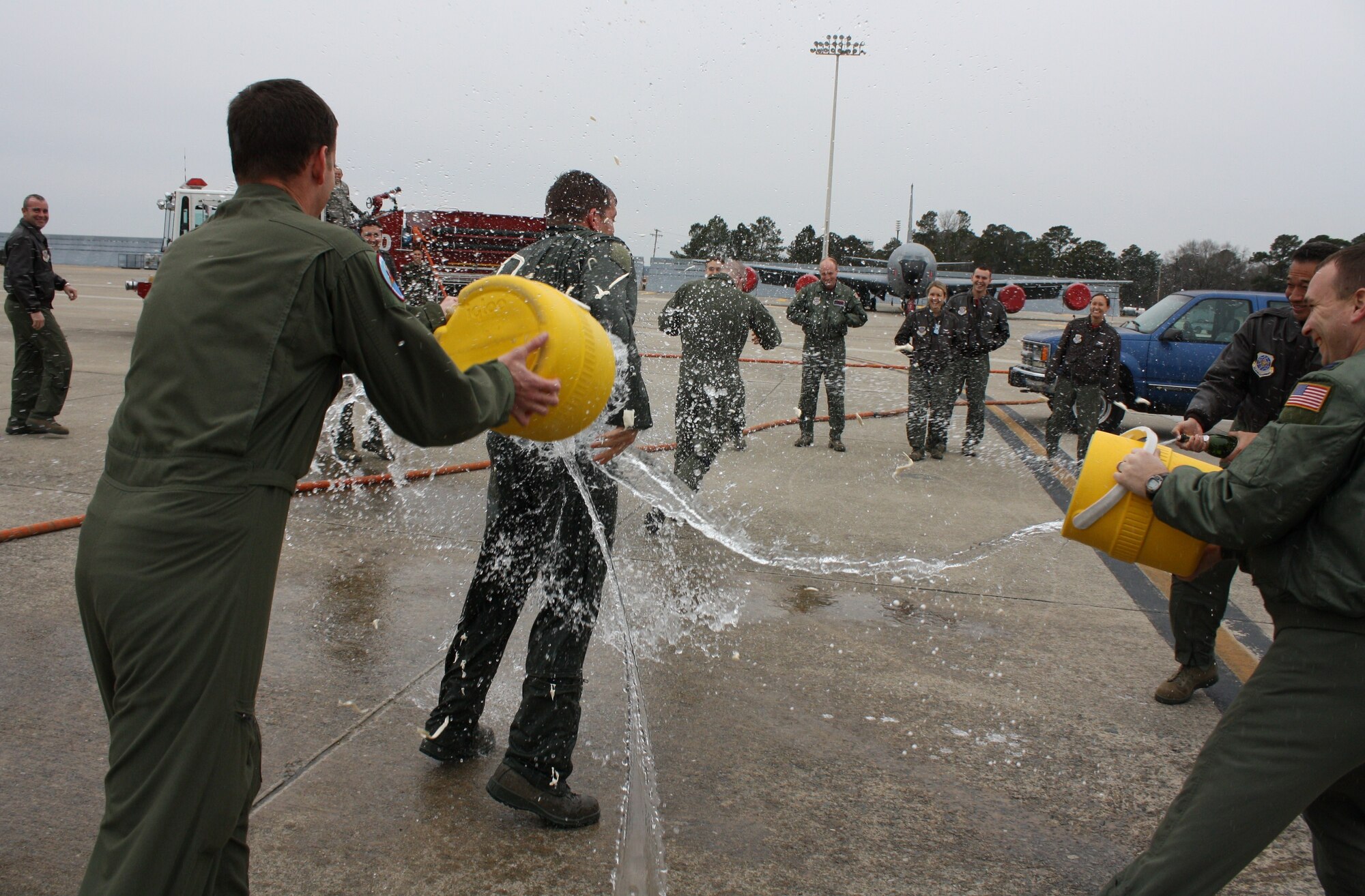 Maj. Vecchione is splashed down by members of the 911th Air Refueling Squadron upon his final KC-135R flight with the 916th Air Refueling Wing. (Courtesy photo)