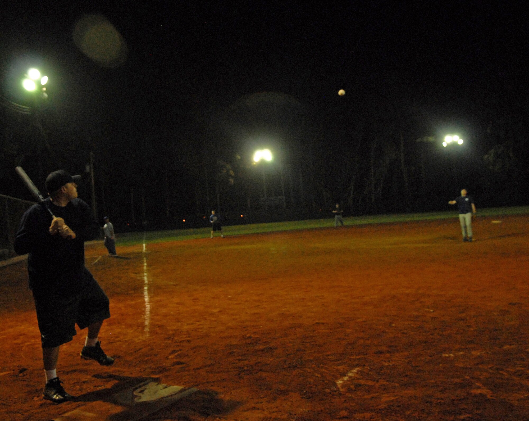 VANDENBERG AIR FORCE BASE, Calif. -- Let the games begin! Members of the 30th Space Communications Squadron play against the Army Prison Guards during a winter intramural softball practice game here Tuesday, Feb. 16, 2010. There are a total of 13 teams competing this season. (U.S. Air Force photo/Airman 1st Class Kerelin Molina)
