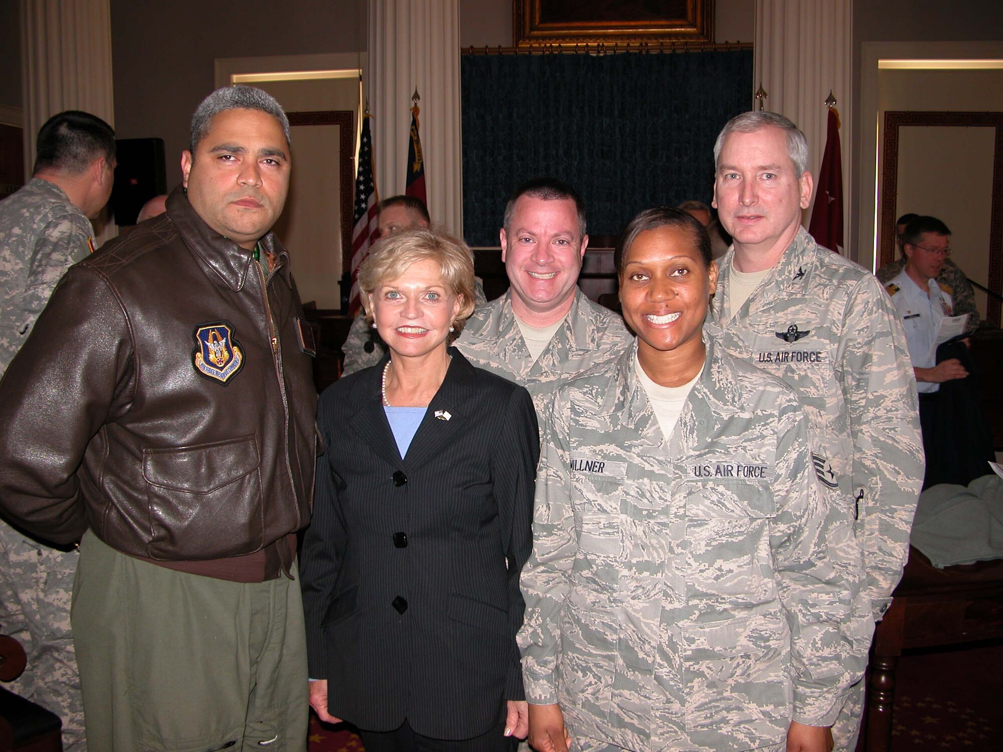 Col. Fritz Linsenmeyer (right), commander of the 916th Air Refueling Wing poses with North Carolina Governor Bev Perdue and fellow 916th Airmen Tech. Sgt. Jorge Brewer (left),  Senior Master Sgt. Brian Sterling (center) and Staff Sgt. Rachel Millner (center) on Feb 16 in Raleigh. (Courtesy photo)