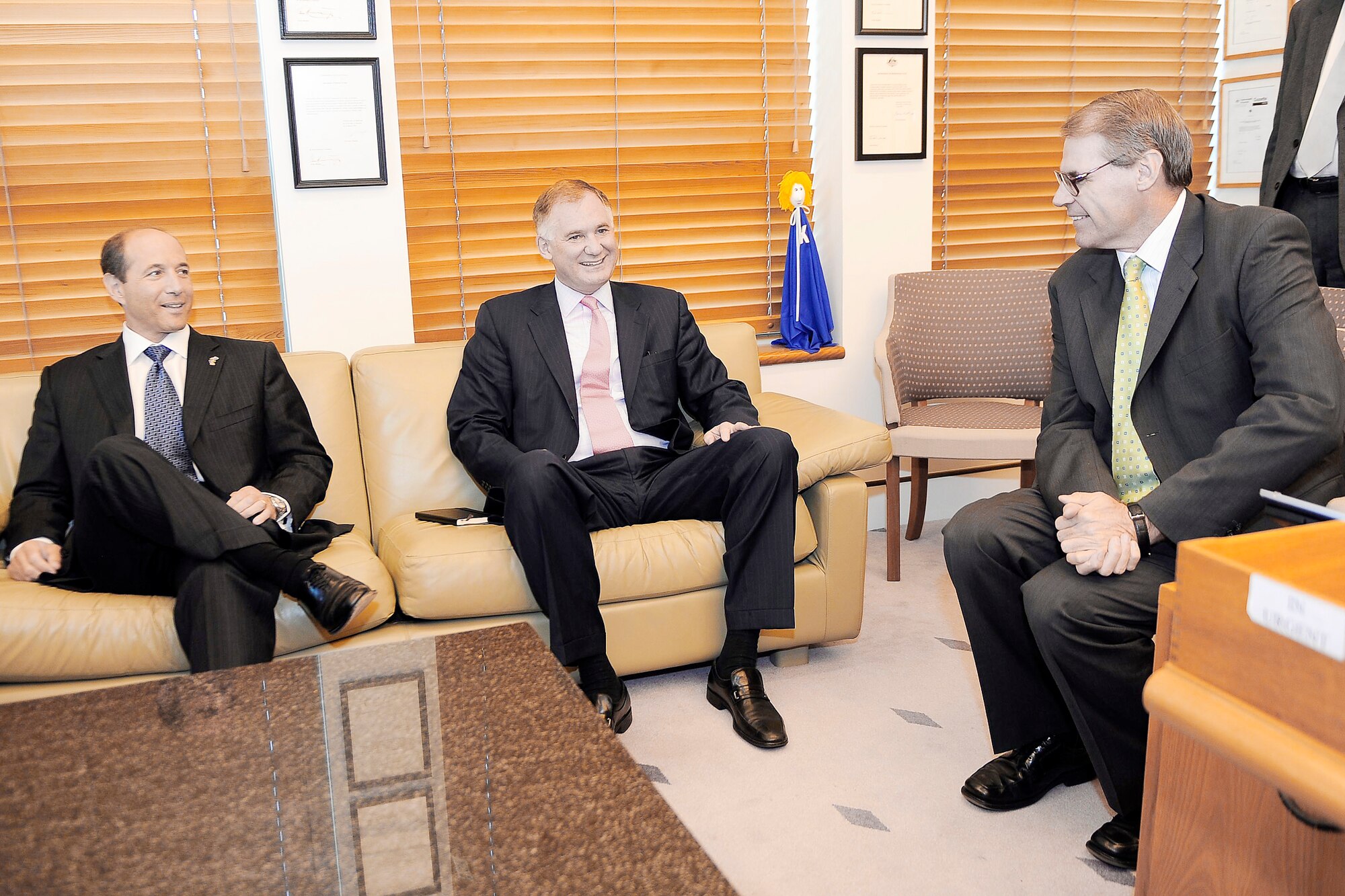 U.S. Ambassador to Australia Jeffrey Bleich (left) and U.S. Deputy Defense Secretary William J. Lynn III meet with Australia's Defense Minister John Faulkner, right, in Canberra, Australia, Feb. 16, 2010. (DoD photo/Master Sgt. Jerry Morrison)  
