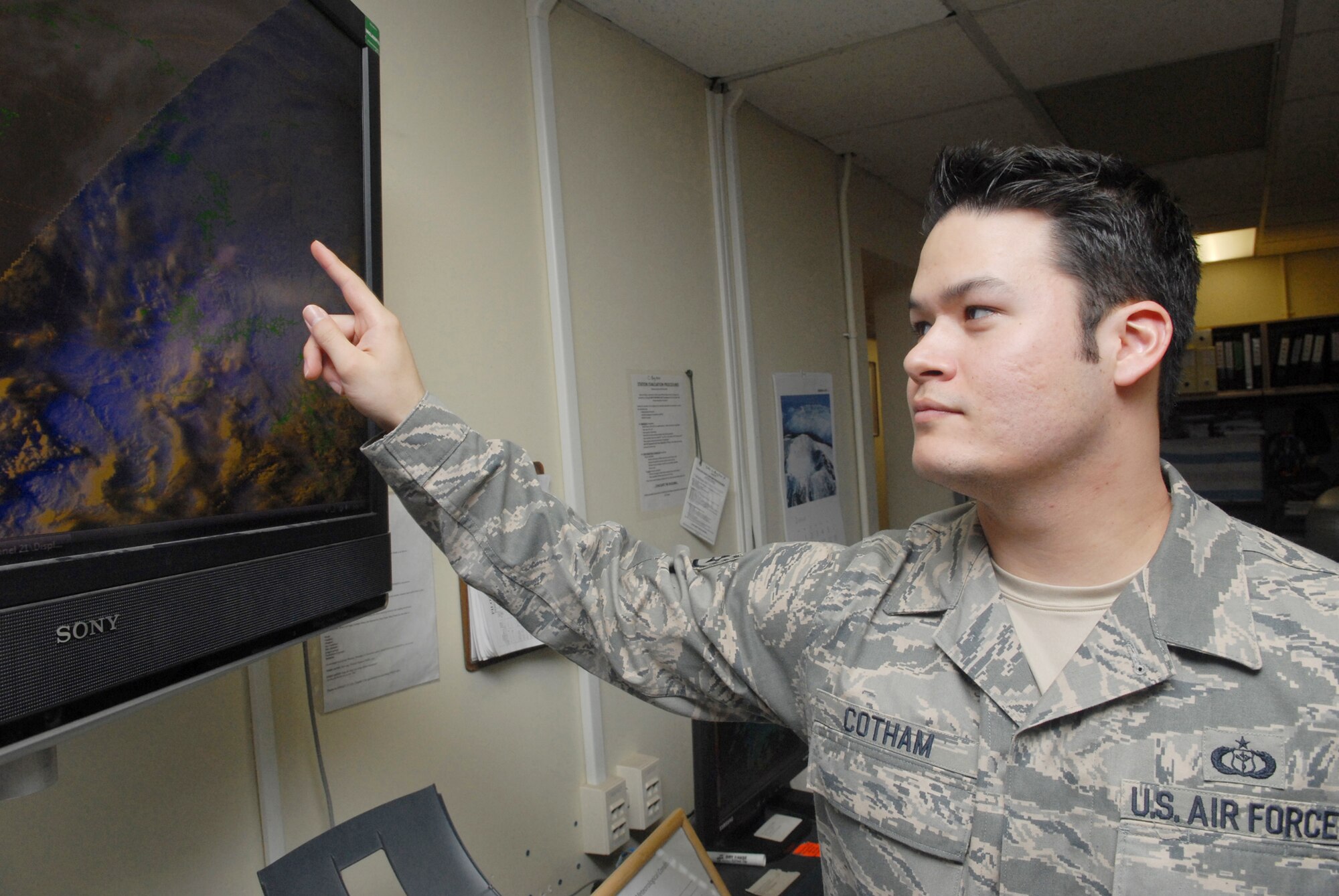Staff Sgt. Jack Cotham observes data from a weather surveillance radar doppler screen Feb. 11, 2010 at Kunsan Air Base, South Korea . Weather Surveillance Radar, 1988, Doppler is commonly called Doppler radar and detects precipitation and atmospheric movement or wind. Sergeant Cotham is a 8th Operation Support Squadron weather forecaster. (U.S. Air Force photo/Senior Airman Roy Lynch)