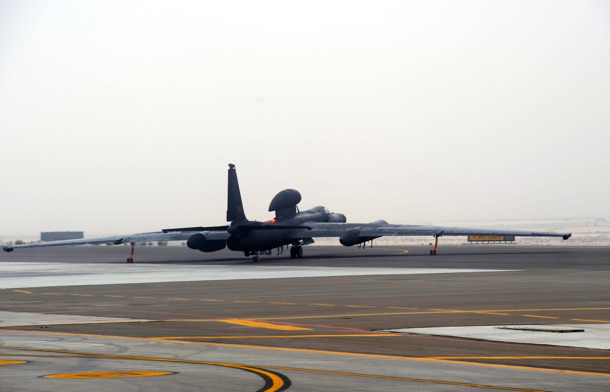 A pilot steers a U-2 Dragonlady toward the runway for a mission from a non-disclosed base in Southwest Asia on Feb. 16, 2010.  The U-2, assigned to the 99th Expeditionary Reconnaissance Squadron, is a single-seat, single-engine, high-altitude/near space reconnaissance and surveillance aircraft providing signals, imagery and electronic measurements and signature intelligence. As part of the 380th Air Expeditionary Wing, the 99th ERS supports operations Iraqi Freedom and Enduring Freedom and the Combined Joint Task Force-Horn of Africa. (U.S. Air Force Photo/Master Sgt. Scott T. Sturkol/Released)