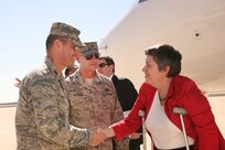 Col. Patrick Fogarty (left), 802nd Mission Support Group commander, and Brig. Gen. Leonard Patrick, 502nd Air Base Wing commander, greet Department of Homeland Security Secretary Janet Napolitano upon her arrival at Lackland's Kelly Field Annex Feb. 16. During her visit to the base, Secretary Napolitano toured the Transportation Security Administration working dog training facility. (U.S. Air Force photo/Robbin Cresswell)
