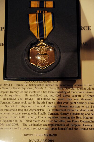 MOODY AIR FORCE BASE, Ga. -- An Air Force Commendation Medal waits to be presented to the family members of Staff Sgt. David Horney and Senior Airman Chad Rice, 824th Security Forces Squadron members, here Feb. 13. Both were presented this achievement medal in honor of their dedication and meritorious services while deployed. (U.S. Air Force photo by Airman 1st Class Joshua Green)
