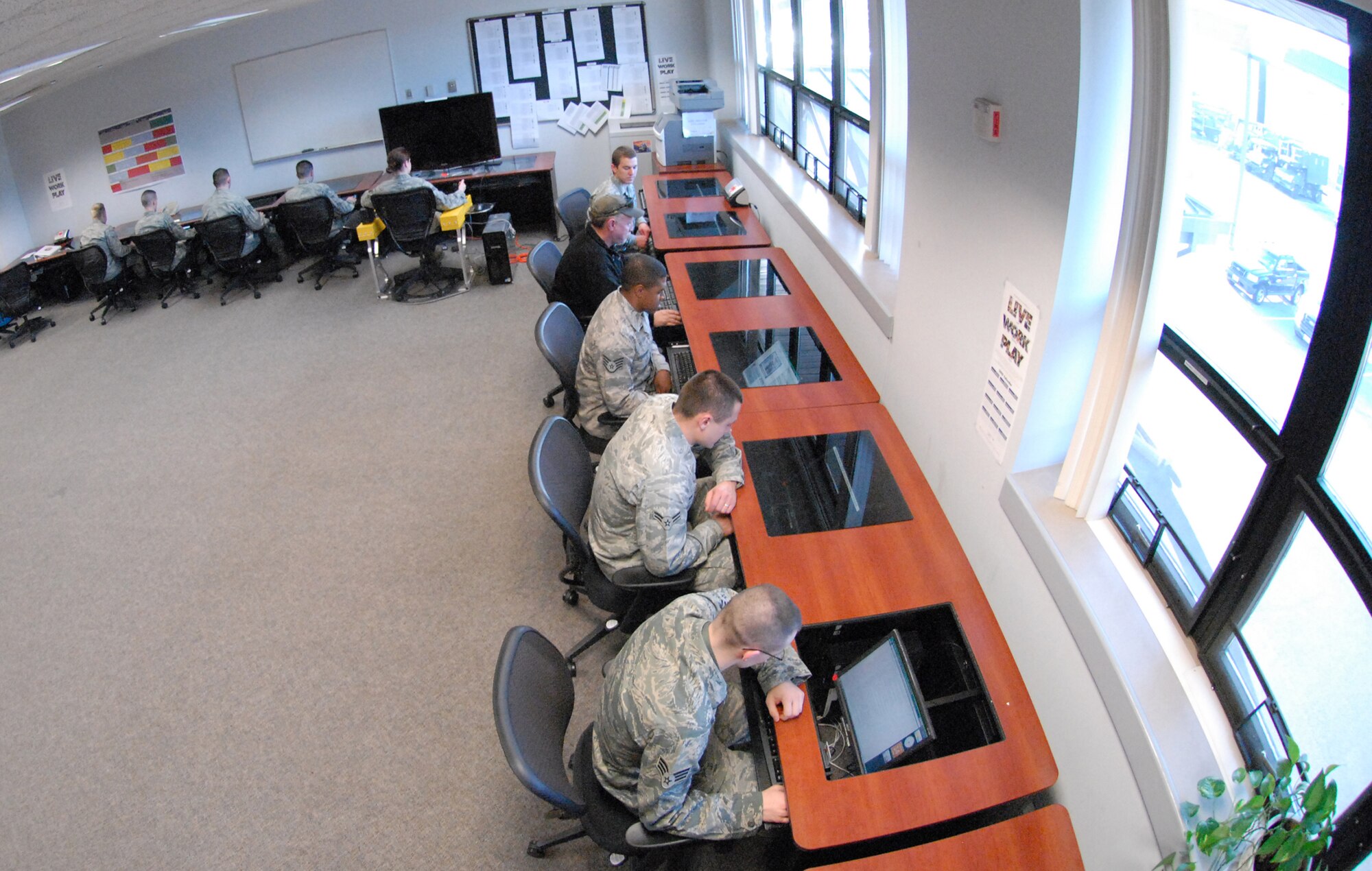 Airmen from the 436th and 512th Aircraft Maintenance Squadron Airmen use their new break room in Building 760. (U.S. Air Force photo/Airman 1st Class Shen-Chia Chu)