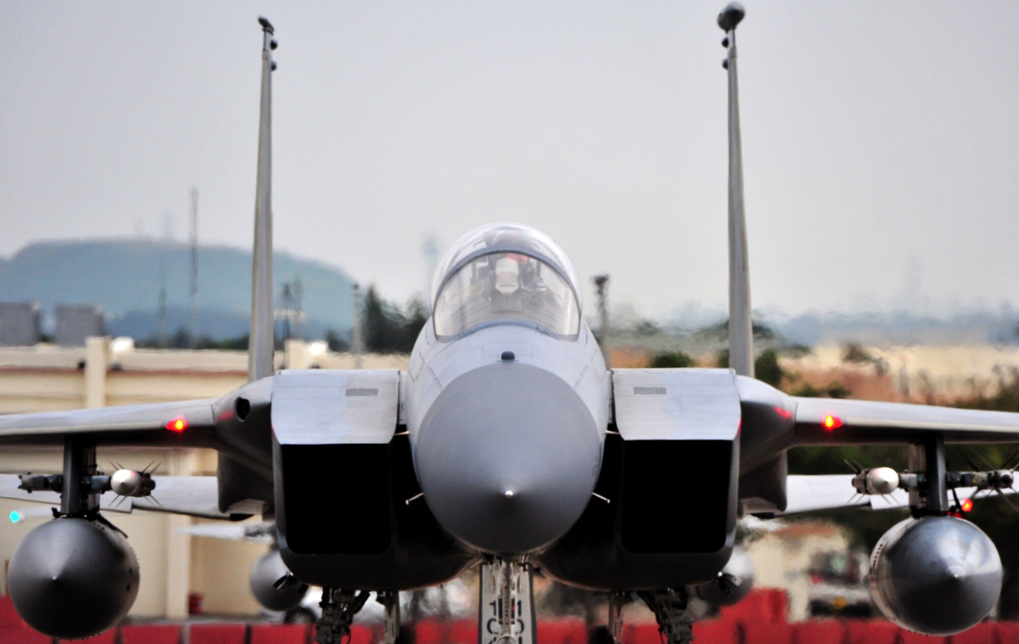 Members of the 44th Fighter Squadron return to Kadena Air Base, Japan, Feb. 18, from Red Flag 10-2, a 10-day aerial combat exercise held at Nellis Air Force Base, Nev. The pilots and maintenance crews worked day and night to complete 128 sorties and amass 260 hours of flying time. (U.S. Air Force photo/Tech. Sgt. Rey Ramon)  