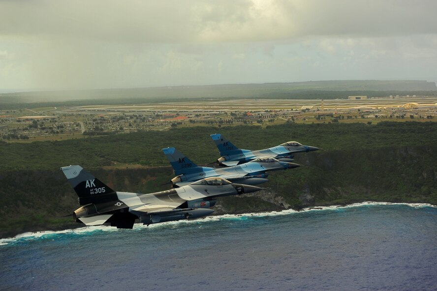 U.S. Air Force F-16 Fighting Falcons from the 18th Aggressor Squadron, Eielson Air Force Base, Alaska, conduct a mission near Andersen AFB, Guam, during Exercise Cope North, Feb. 15, 2010. The United States Air Force and the Japan Air Self-Defense Force conduct Cope North annually at Andersen Air Force Base to increase combat readiness and interoperability, concentrating on coordination and evaluation of air tactics, techniques and procedures. The ability for both nations to work together increases their preparedness to support real-world contingencies.  (U.S. Air Force photo by Staff Sgt. Jacob N. Bailey / Released)