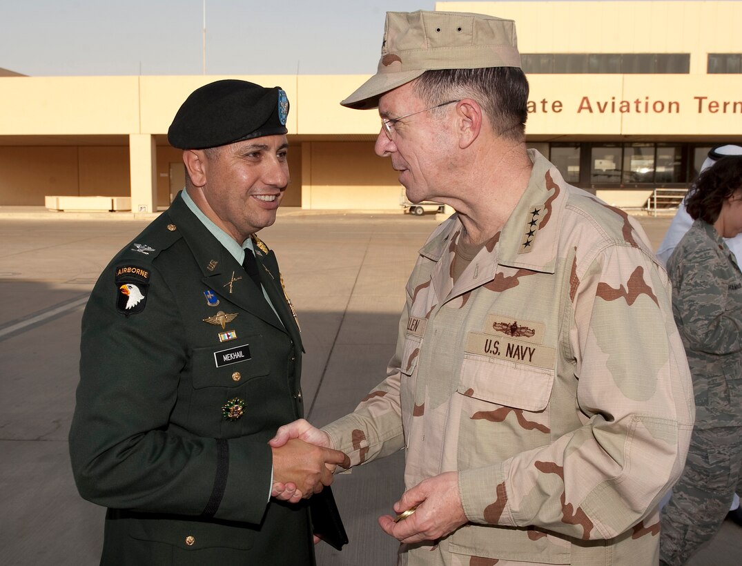 U.S. Navy Adm. Mike Mullen, right, chairman of the Joint Chiefs of Staff, shakes hands with U.S. Army Col. Tarek Mekhail, defense attache for the U.S. Embassy in Saudi Arabia,  during a visit to Riyadh, Saudi Arabia, Feb. 17, 2010. 
