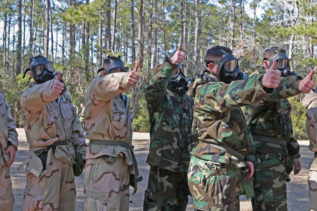 Marines with Combat Logistics Regiment 27, 2nd Marine Logistics Group, give the gas chamber instructor a thumbs-up, confirming the functionality of their gas masks, during a gas chamber training exercise aboard Camp Lejeune, N.C., Feb. 19, 2010.  The gas chamber is an annual requirement for all Marines in order to build confidence in their gear and ensure it functions properly.  (U.S. Marine Corps photo by Lance Cpl. Melissa A. Latty)