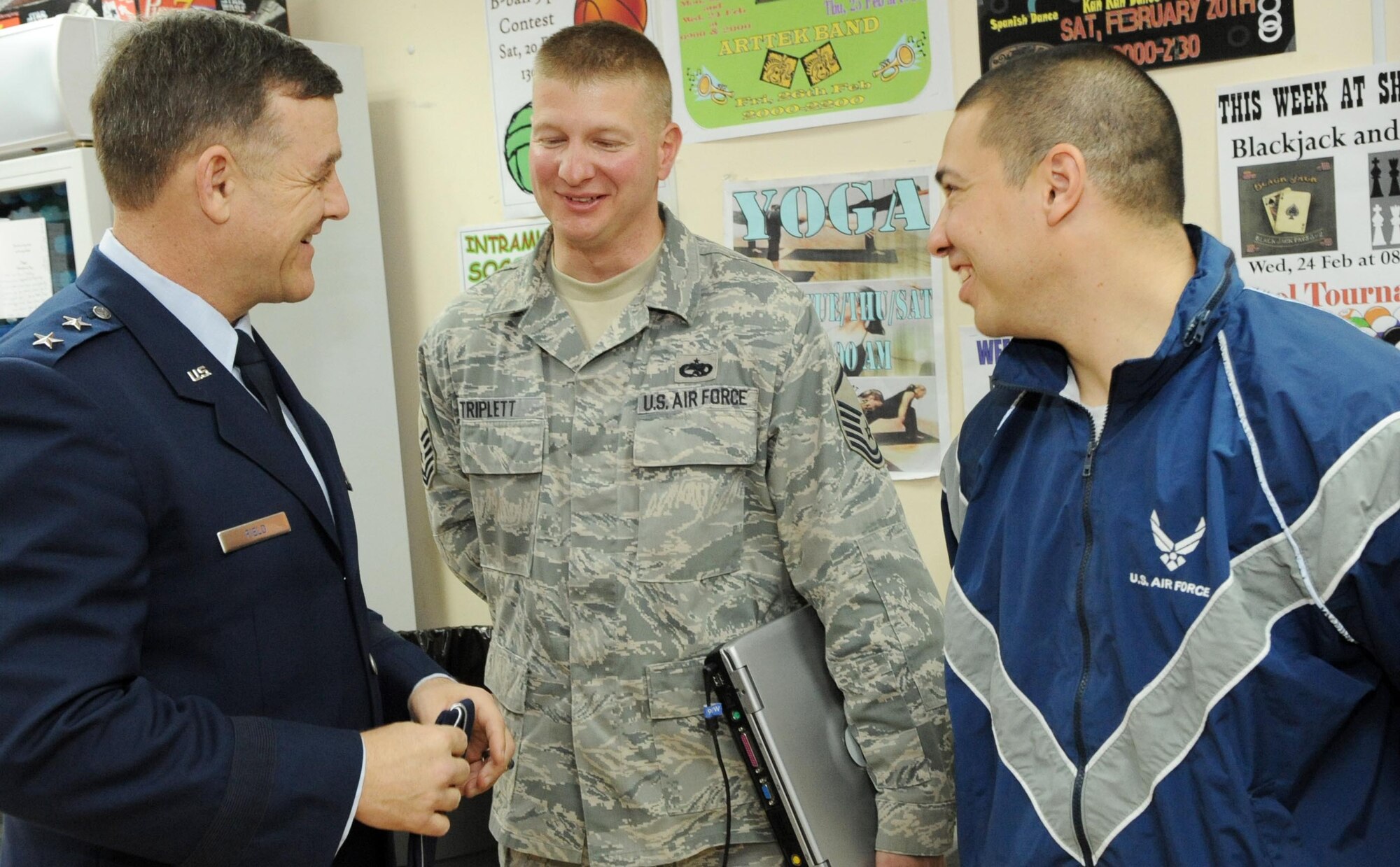 Maj. Gen. Burton M. Field, Senior Military Adviser to the U.S. Special Representative for Afghanistan and Pakistan Ambassador Richard Holbrooke, speaks with Master Sgt. Todd Triplett and Tech. Sgt. Ricardo Cabezas during a visit to the Transit Center at Manas, Kyrgyzstan, Feb. 19, 2010. Both sergeants are from the 75th Air Base Wing Communications Directorate, Hill Air Force Base, Utah. (U.S. Air Force photo/Senior Airman Nichelle Anderson/released). 
