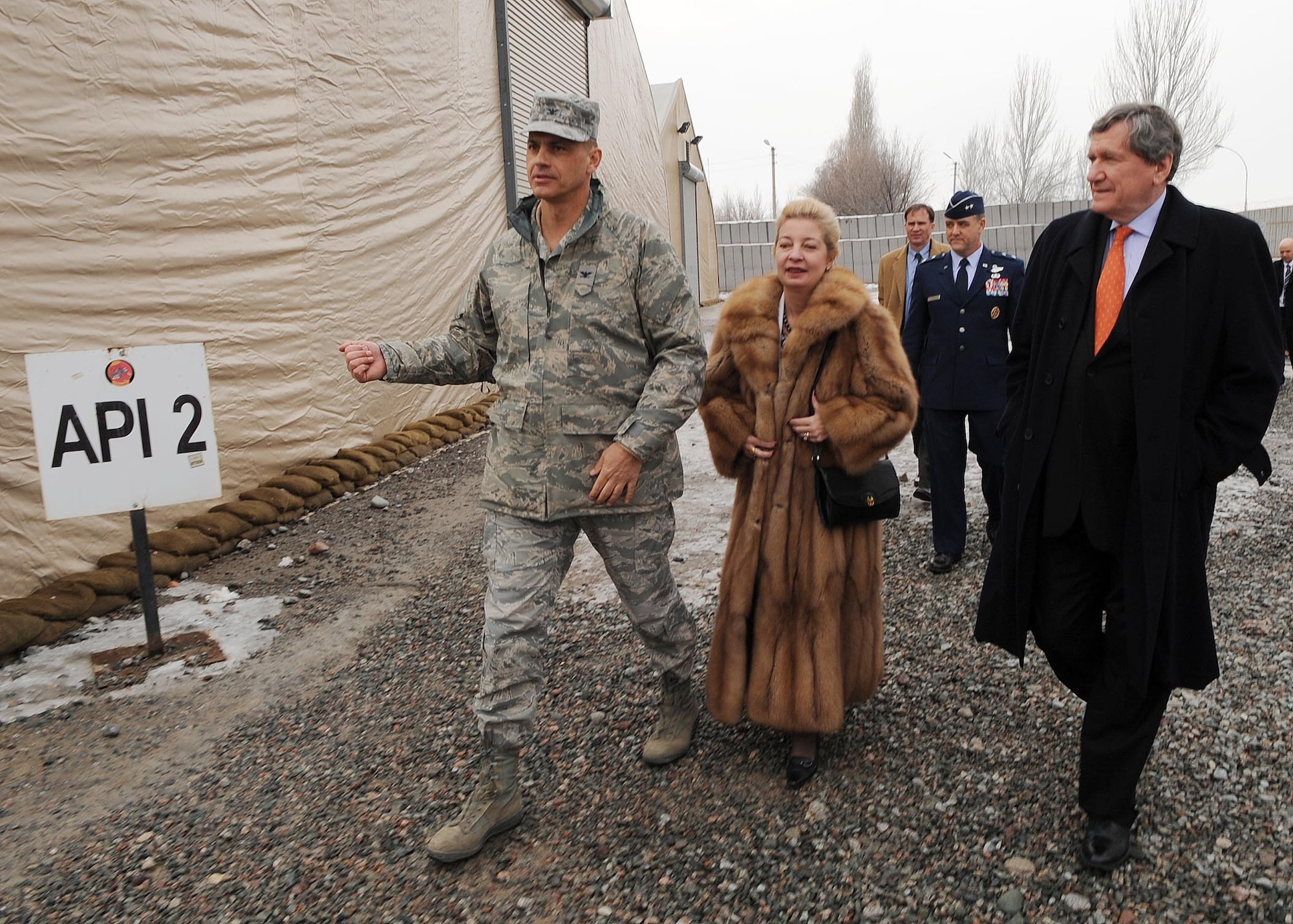 376th Air Expeditionary Wing Vice Commander, Col. Adam Dabrowski, gives U.S. Special Representative for Afghanistan and Pakistan, Ambassador Richard Holbrooke, and U.S. Ambassador to Kyrgyzstan, Tatiana Gfoeller, a tour of the transient tents at the Transit Center at Manas, Kyrgyzstan, Feb. 19, 2010. During his stay at the Transit Center, Holbrooke met and spoke with transiting Soliders, Airmen, and Marines. (U.S. Air Force photo/Senior Airman Nichelle Anderson/released). 
