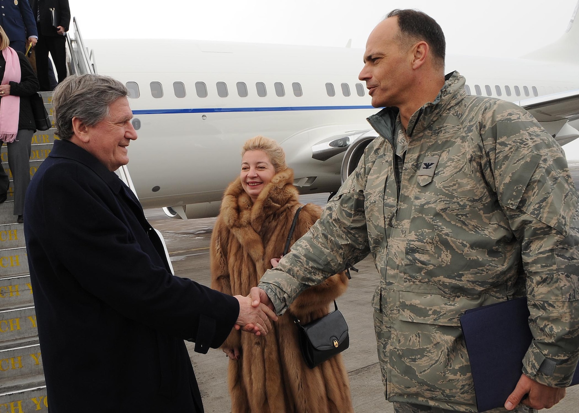 376th Air Expeditionary Wing Vice Commander, Col. Adam Dabrowski, greets U.S. Special Representative for Afghanistan and Pakistan, Ambassador Richard Holbrooke, after his arrival at the Transit Center at Manas, Kyrgyzstan, Feb. 19, 2010.  During his stay at the Transit Center, Holbrooke met and spoke with transiting Soliders, Airmen and Marines. (U.S. Air Force photo/Senior Airman Nichelle Anderson/released). 
