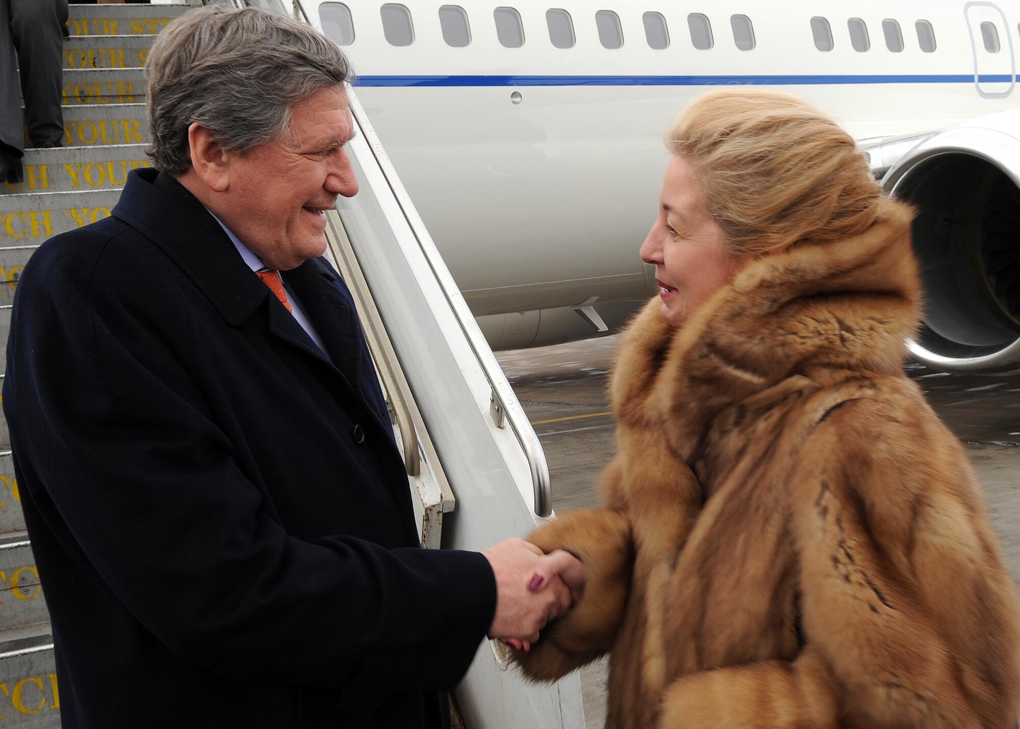 U.S. Ambassador to Kyrgyzstan, Tatiana Gfoeller, greets U.S. Special Representative for Afghanistan and Pakistan, Ambassador Richard Holbrooke, after his arrival at the Transit Center at Manas, Feb. 19, 2010.  During his stay, Holbrooke met and spoke with transiting Soliders, Airmen and Marines. (U.S. Air Force photo/Senior Airman Nichelle Anderson/released). 
