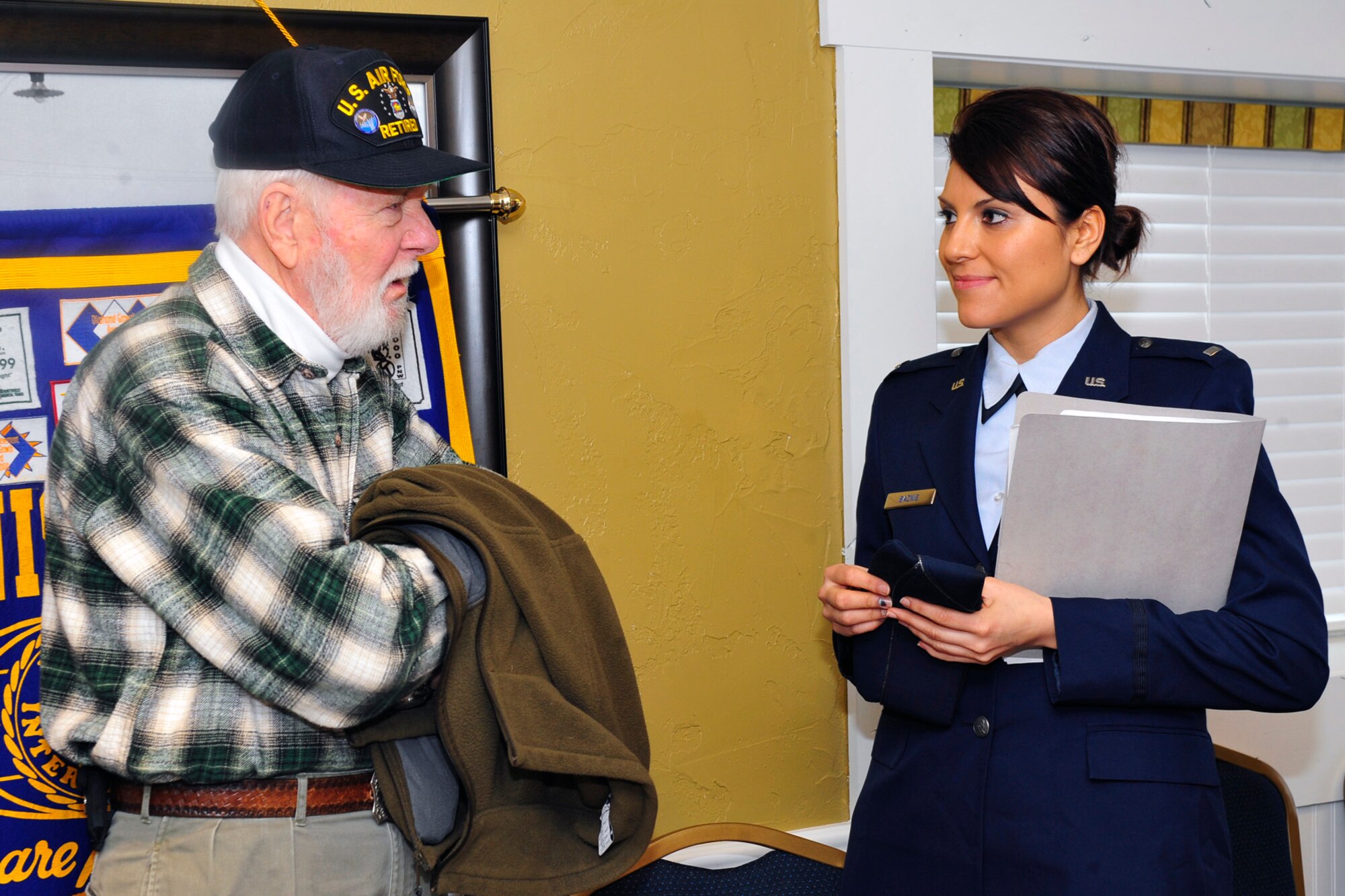 POST FALLS, Idaho – Lt. Col. (Ret.) Dean Bartlett, former member of the Strategic Air Command inspector general, speaks with 1st Lt. Noel Bacnis about his time in the Air Force at a Kiwanis Club meeting in Post Falls, Idaho, Feb. 11. Mr. Bartlett is a board member of the Post Falls Kiwanis Club. (U.S. Air Force photo / Senior Airman Joshua Chapman)