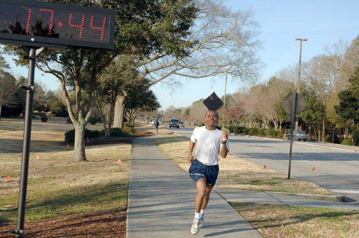Second Lt. Freddie Stephens crosses the finish line during the monthly commander's fitness challenge Feb. 19, 2010, at Joint Base Charleston, S.C. Lieutenant Stephens was the second place finisher in the male category with a time of 17:44. Lieutenant Stephens is assigned to the 628th Civil Engineer Squadron. (U.S. Air Force photo/Staff Sgt. Marie Brown)
