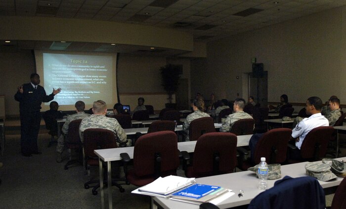 Staff Sgt. Charles Barbee speaks to his audience at the Wing Leadership Symposium held at the education center here Feb. 18. During the symposium, Sergeant Barbee spoke about the influences in his life that motivated him to reach out to his community and positively impact the youth through his volunteered time. Sergeant Barbee is a knowledge operator with the 628th Air Base Wing plans office. (U.S. Air Force photo/Airman 1st Class Lauren Main)