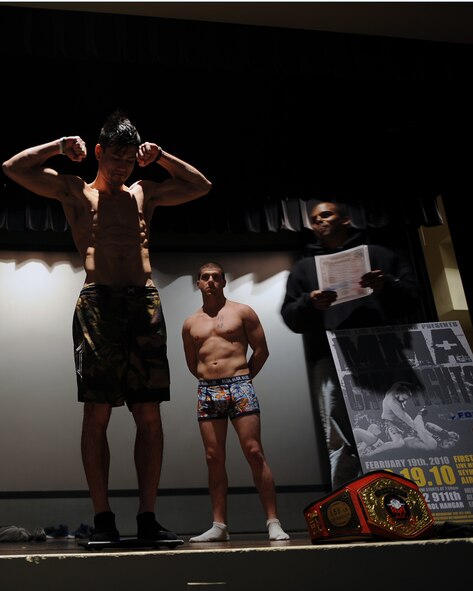 Matthew Tran, Fit Factory bantamweight champion and International Sport Karate Association bantamweight associate champion, weighs-in at the base theater before a mixed martial arts cagefight on Seymour Johnson Air Force Base, N.C., Feb. 18, 2010. Tran will compete against Zach Hazlett, MMA fighter, in the featherweight division Feb. 19, 2010. To compete in the featherweight division, fighters must weigh in at no less than 136 pounds and no more than 145 pounds.(U. S. Air Force photo/Senior Airman Ciara Wymbs) 