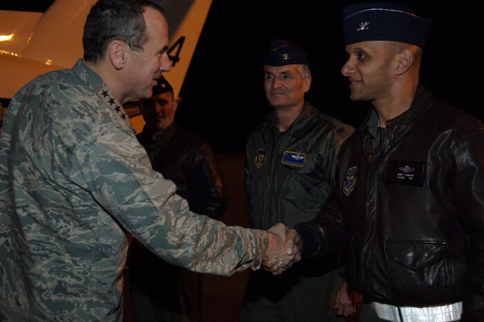 Gen. Raymond Johns is greeted by Col. Brian Robinson after his evening arrival here Feb. 17. General Johns paid a brief visit to Joint Base Charleston before departing for Haiti to survey the relief efforts for Operation Unified Response. General Johns is the commander of Air Mobility Command and Colonel Robinson is the 437th Airlift Wing vice commander. (U.S. Air Force Photo/Airman 1st Class Lauren Main)