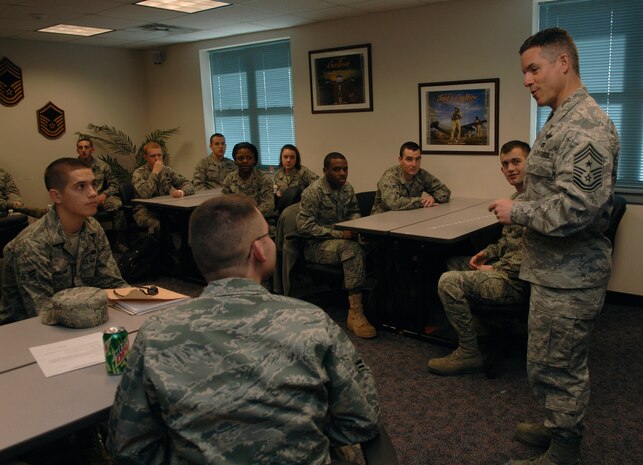 Chief Master Sgt. David Spector speaks with Airmen at the First Term Airmen Center here Feb. 17. The FTAC was one of several stops on a tour of the base, which also included eating breakfast with Airmen at the dining facility. Chief Spector joined the Air Force in 1981 and has moved up through the ranks to his current position, devoting his duties to ensure a strong enlisted force. Chief Spector is the command chief of Air Mobility Command. (U.S. Air Force photo/Airman 1st Class Lauren Main)