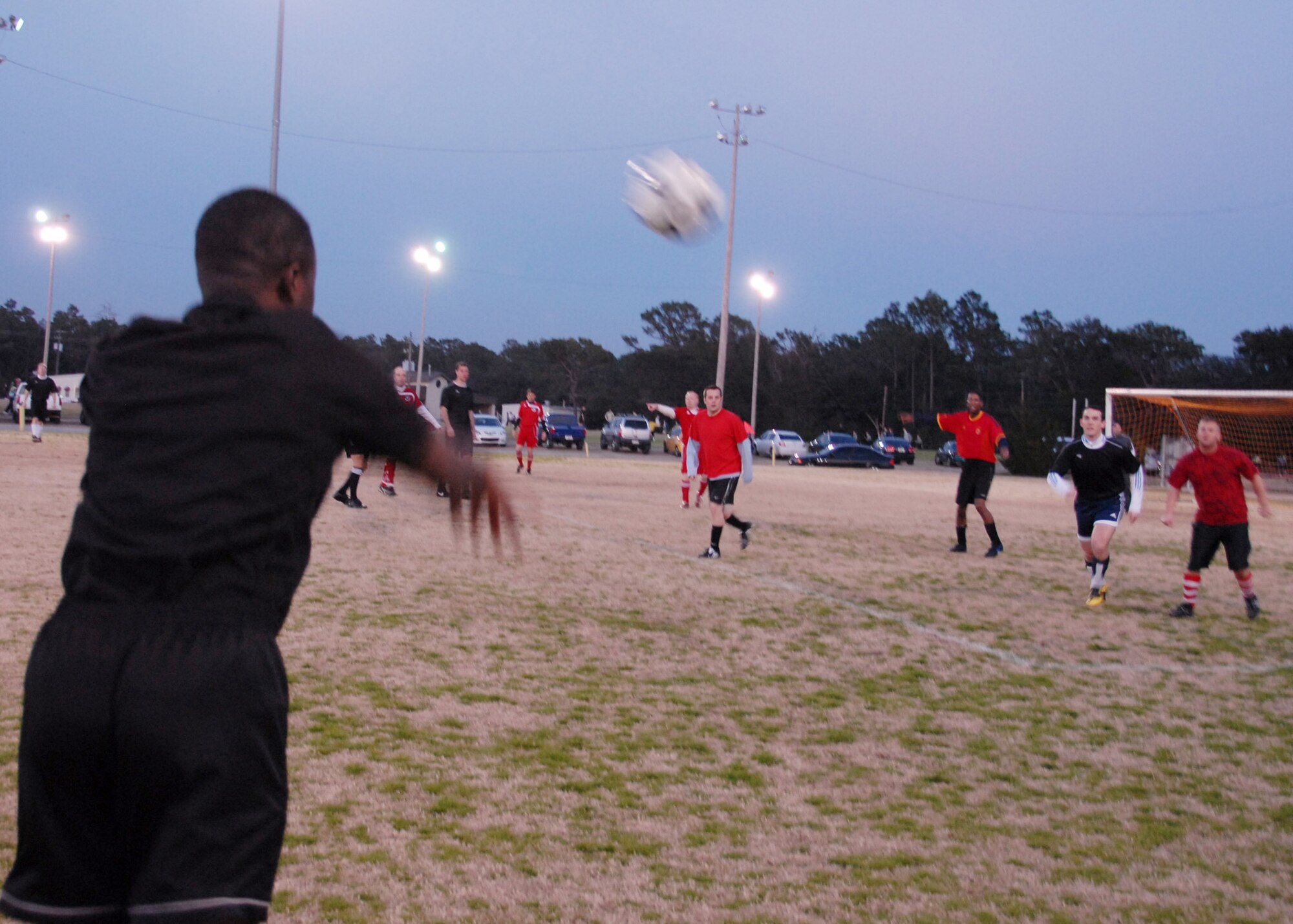EGLIN AIR FORCE BASE, Fla. – A member of the Air Force Research Laboratory tosses the ball back into play during an intramural soccer matchup against the 96th Medical Group, Feb. 17. AFRL came out victorious in the matchup, winning 1-0. Games are played Monday through Thursday, at 5:30 and 7 p.m. (U.S. Air Force photo/ Airman 1st Class Anthony Jennings)