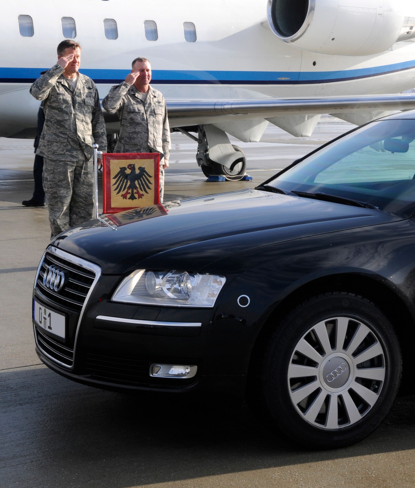 SPANGDAHLEM AIR BASE, Germany – Lt. Gen. Frank Gorenc, 3rd Air Force commander, and Col. Tip Wight, 52nd Fighter Wing commander, salute Horst Koehler, federal president of Germany, as he departs the flightline Feb. 18. President Koehler and his wife, Eva Luise, were also greeted by Kurt Beck, Rheinland-Pflaz minister president, and his wife, Roswitha. This was the first time President Koehler has visited the Trier region. (U.S. Air Force photo/Airman 1st Class Staci Miller)