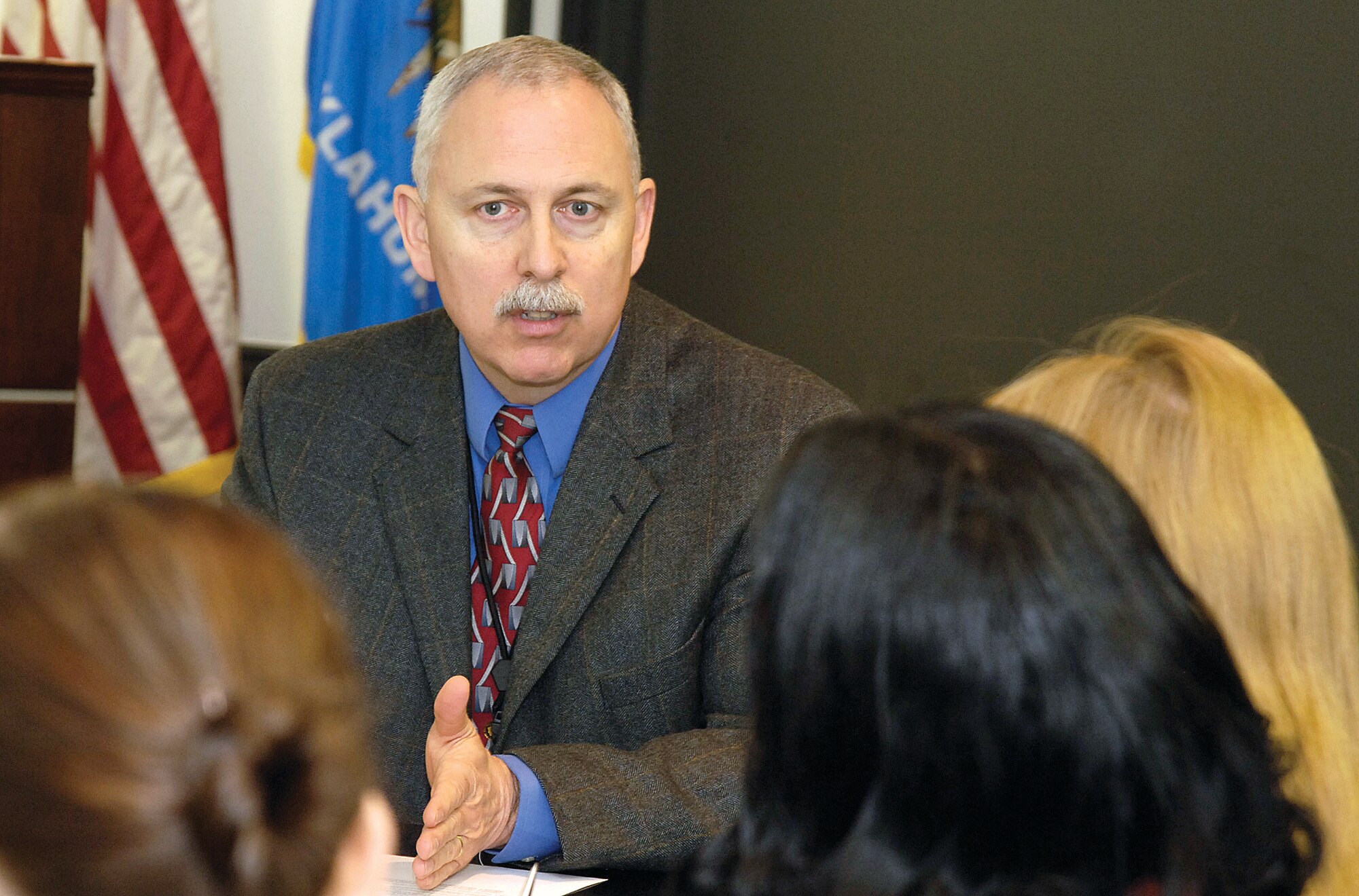 John Over, Oklahoma City Air Logistics Center executive director, leads a recent work force focus group meeting with 72nd Air Base Wing employees as part of ALC lean transformation efforts.  This meeting is one of many that Maj. Gen. David Gillett, OC-ALC commander, Col Paul Waugh, OC-ALC vice commander and other ALC senior leaders are conducting with the work force to discuss the ALC's strategic goals and objectives. For more information on the goals and objectives, visit Tinker’s internal homepage. (Air Force photo by Margo Wright)