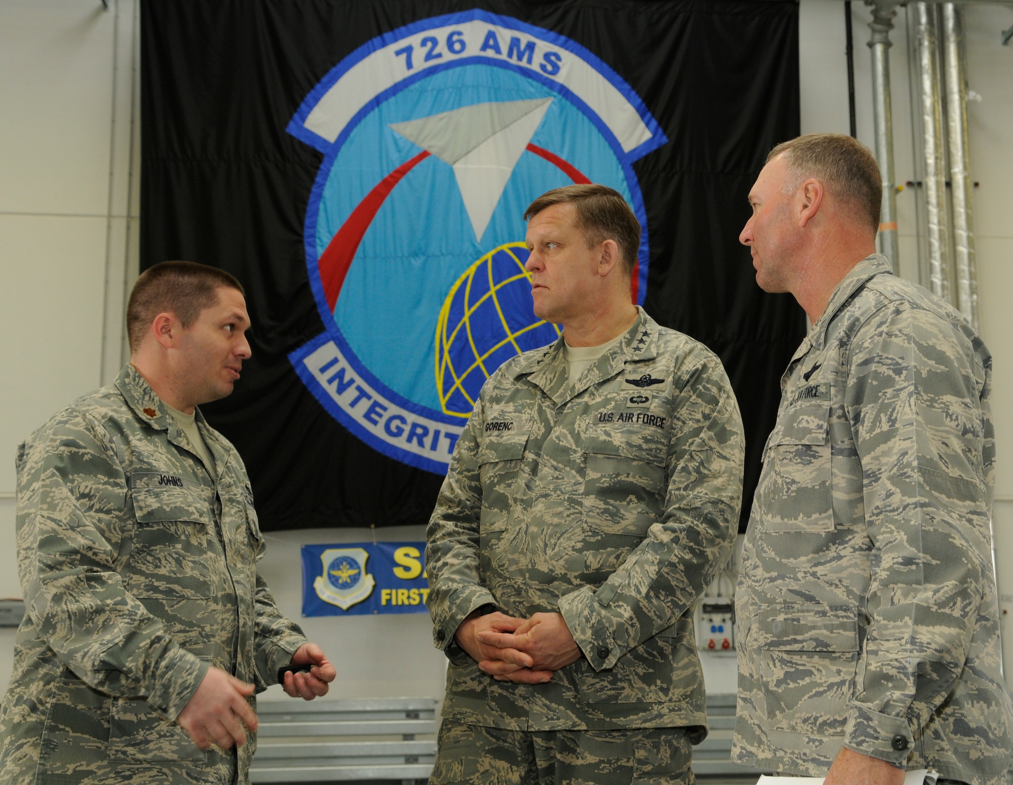 SPANGDAHLEM AIR BASE, Germany – Maj. Jeffery John, 726th Air Mobility Squadron deputy commander, briefs Lt. Gen. Frank Gorenc, 3rd Air Force commander, and Col. Tip Wight, 52nd Fighter Wing commander, about the mission capabilities and facilities of the 726th AMS during General Gorenc’s visit to Spangdahlem Air Base Feb. 18. General Gorenc visited Spangdahlem to speak to Airmen about daily operations, programs that are working well and areas of concern. (U.S. Air Force photo/Senior Airman Benjamin Wilson)