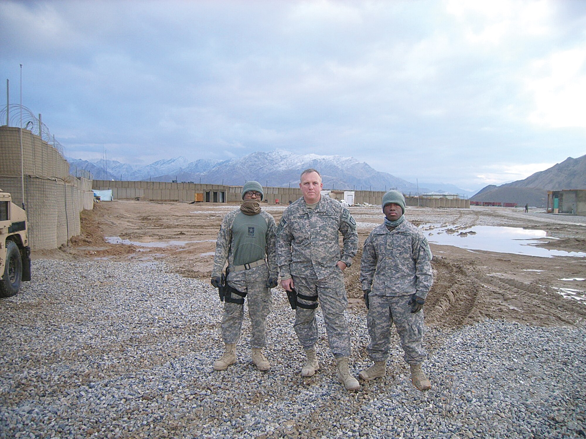 Tinker 72nd Security Forces Squadron’s Senior Airman Jerry Christopher, Master Sgt. James Mogren and Staff Sgt. Kristopher Gaithright, from left, are shown at a base in Afghanistan last year. Their humanitarian mission as part of a Provincial Reconstruction Team, rebuilding the area with schools, water wells and roadways, placed them in areas thick with the Taliban and required a constant combative cover. Though wounded when their vehicle was destroyed by an improvised explosive device, Sergeant Mogren’s actions helped earn him the Billy Jack Carter Award for 2009. Sergeant Mogren is quick to deflect praise and says his actions are reflective of every SFS member and one reason the unit took the AFMC top large security forces unit award for 2009. (Courtesy photo)
