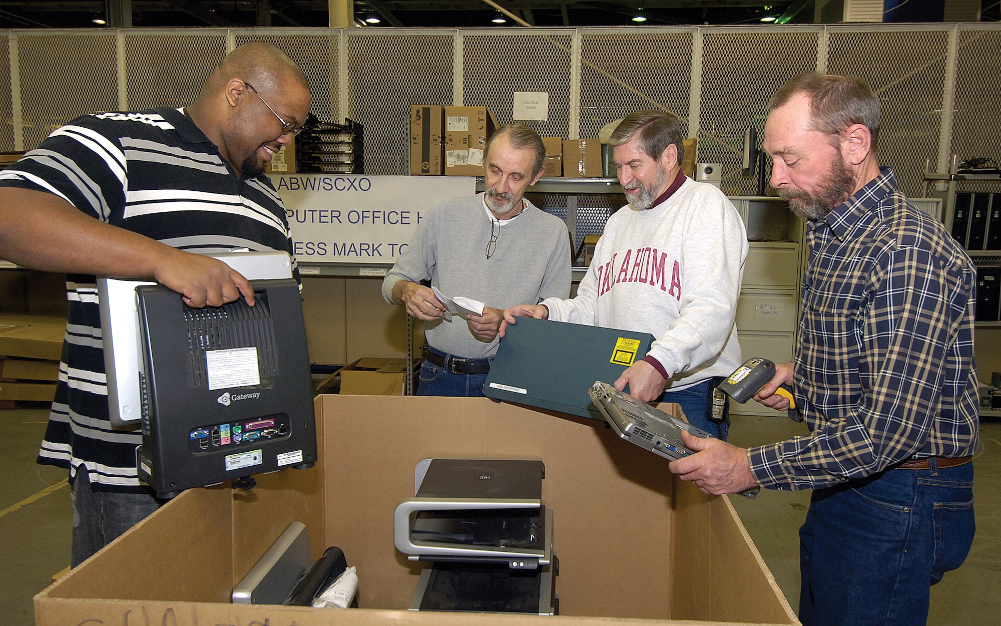Cradle to Grave is a short name for a large job this team tackles daily for Tinker personnel as they take in excess computer hardware from organizations base wide. The 72nd Air Base Wing Cradle-Grave-Repair office recently celebrated a service milestone by processing their 10,000th item. Brian Carrethers, Carl Davis, Jim Rankin and Doug Tesch, from left, fill another pallet container in Bldg. 3001 with gear for shipment to the Defense Reutilization and Marketing Service. The team’s goal is to make equipment consolidation easier by helping inventory custodians easily dispose of equipment. Now custodians can simply transfer items to the C-G-R who repair or recycle to a new base user or palletize and ship off base. What began as a help to the 76th Maintenance Wing now has customers from every organization and the Cradle-Grave-Repair team plans to expand their locations to two other base areas this year. Call 736-7138 for more information.