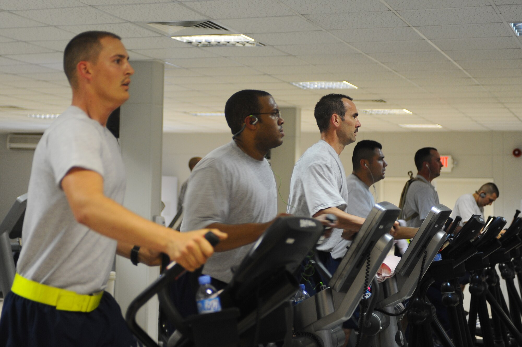 Airmen workout on eliptical machines at a non-disclosed Southwest Asia location Feb. 10, 2010. (U.S. Air Force photo by Senior Kasey Zickmund)