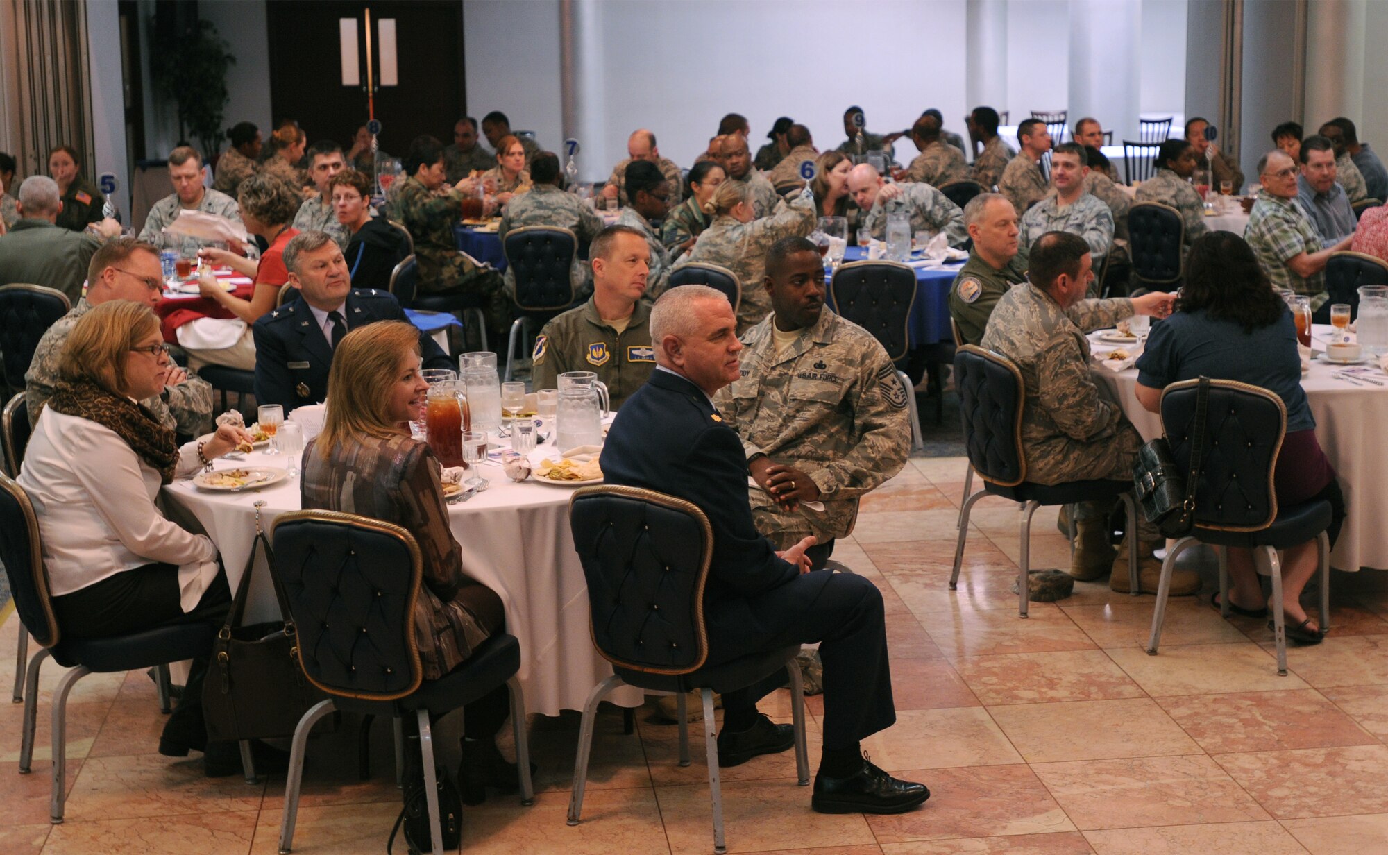 Incirlik members tune in to inspirational music sung by a gospel choir Thursday, Feb. 18, 2010 during the 2010 National Prayer Observance luncheon at Incirlik Air Base, Turkey. The luncheon celebrated the National Prayer day and Incirlik was joined by guest speaker Chaplain (Brig. Gen.) David Cyr, Air Force deputy chief of chaplains. (U.S. Air Force photo/Airman 1st Class Amber Ashcraft)