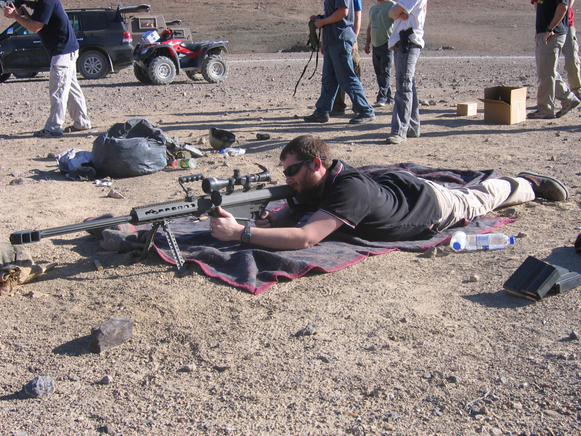 Senior Airman Andrew Blasiman, 100th Communications Squadron, spent some of his deployment time training with the Army special forces guys he was working with in Afghanistan. They taught him to shoot a .50 caliber rifle, which is how he spent Christmas Day, 2008. (Courtesy photo)