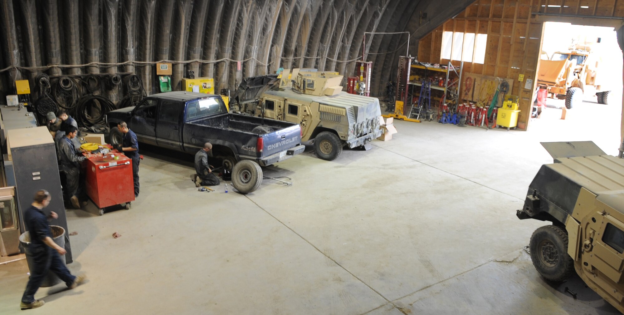 KIRKUK REGIONAL AIR BASE, Iraq –506th Expeditionary Logistics Readiness Squadron vehicle maintainers have a hand in repairing just about any mission essential vehicle on base, including HMMWVs, forklifts, cargo loaders, dodge pickups, ambulances and fire trucks.  (U.S. Air Force photo/Staff Sgt. Tabitha Kuykendall)    
