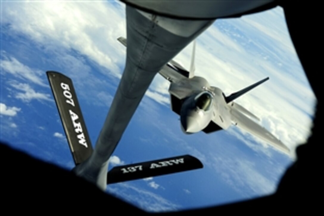 A U.S. Air Force F-22 Raptor aircraft receives fuel from a KC-135 Stratotanker aircraft near Guam, Feb. 17, 2010. The raptor is assigned to the 90th Fighter Squadron on Elmendorf Air Force Base, Alaska, and the Stratotanker is assigned to the 465th Air Refueling Squadron on Tinker Air Force Base, Okla., 