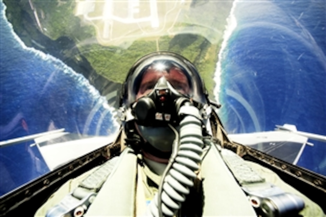 A U.S. Air Force F-16 Fighting Falcon pilot conducts an unrestricted vertical climb from Andersen Air Force Base, Guam, during Exercise Cope North, Feb. 15, 2010. The U.S. Air Force and the Japan Air Self-Defense Force conduct the exercise annually at Andersen to increase combat readiness and interoperability.