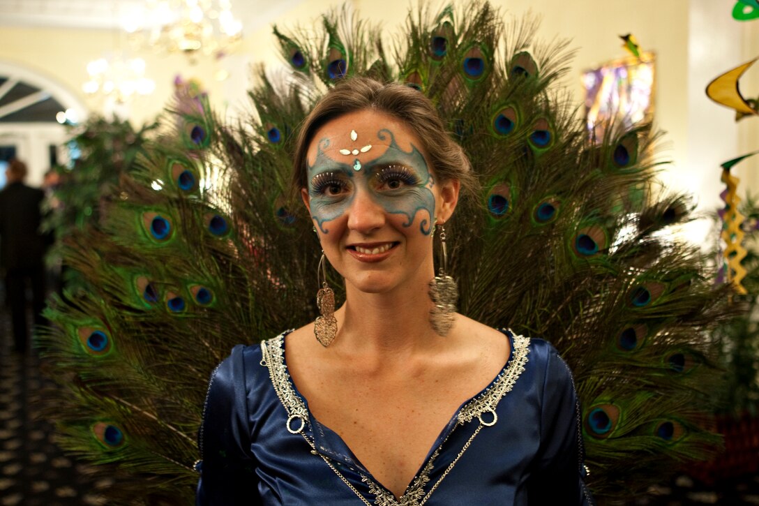 Gina Ciarcia, a military spouse, dresses in an elegant peacock-feathered costume during the Paradise Point Officers’ Club’s Mardi Gras Masquerade, Feb. 20. Hosted by Naval Hospital Camp Lejeune, the masquerade is one of 12 theme parties held on base.