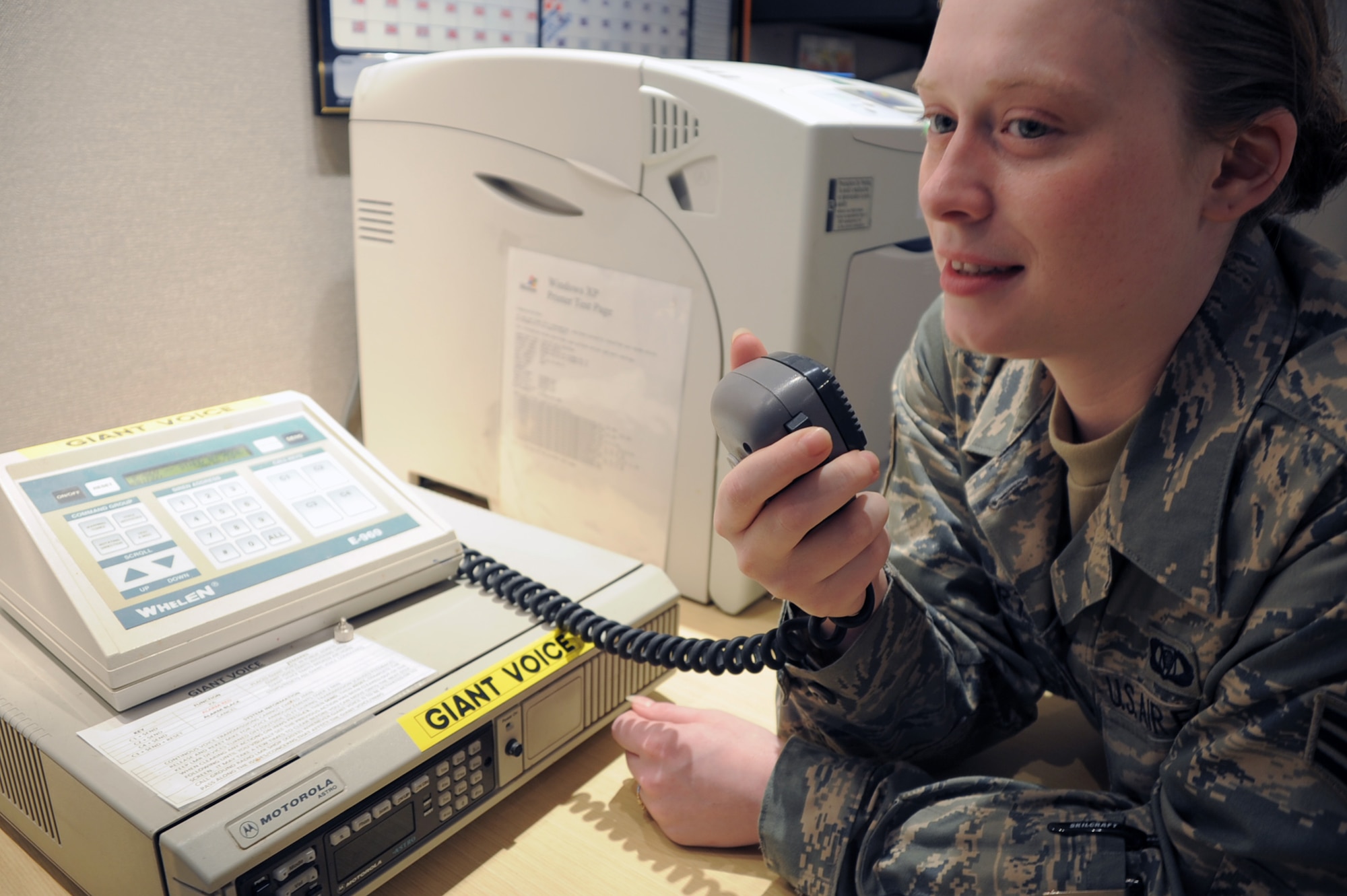 Senior Airman Cindy Rafferty, a command post journeyman with the 380th Air Expeditionary Wing Command Post at a non-disclosed location in Southwest Asia, talks over the giant voice system during operations at a non-disclosed base in Southwest Asia on Feb. 5, 2010. Airman Rafferty is deployed from the 355th Fighter Wing Command Post at Davis-Monthan Air Force Base, Ariz., and her hometown is Albany, N.Y. (U.S. Air Force Photo/Master Sgt. Scott T. Sturkol/Released)