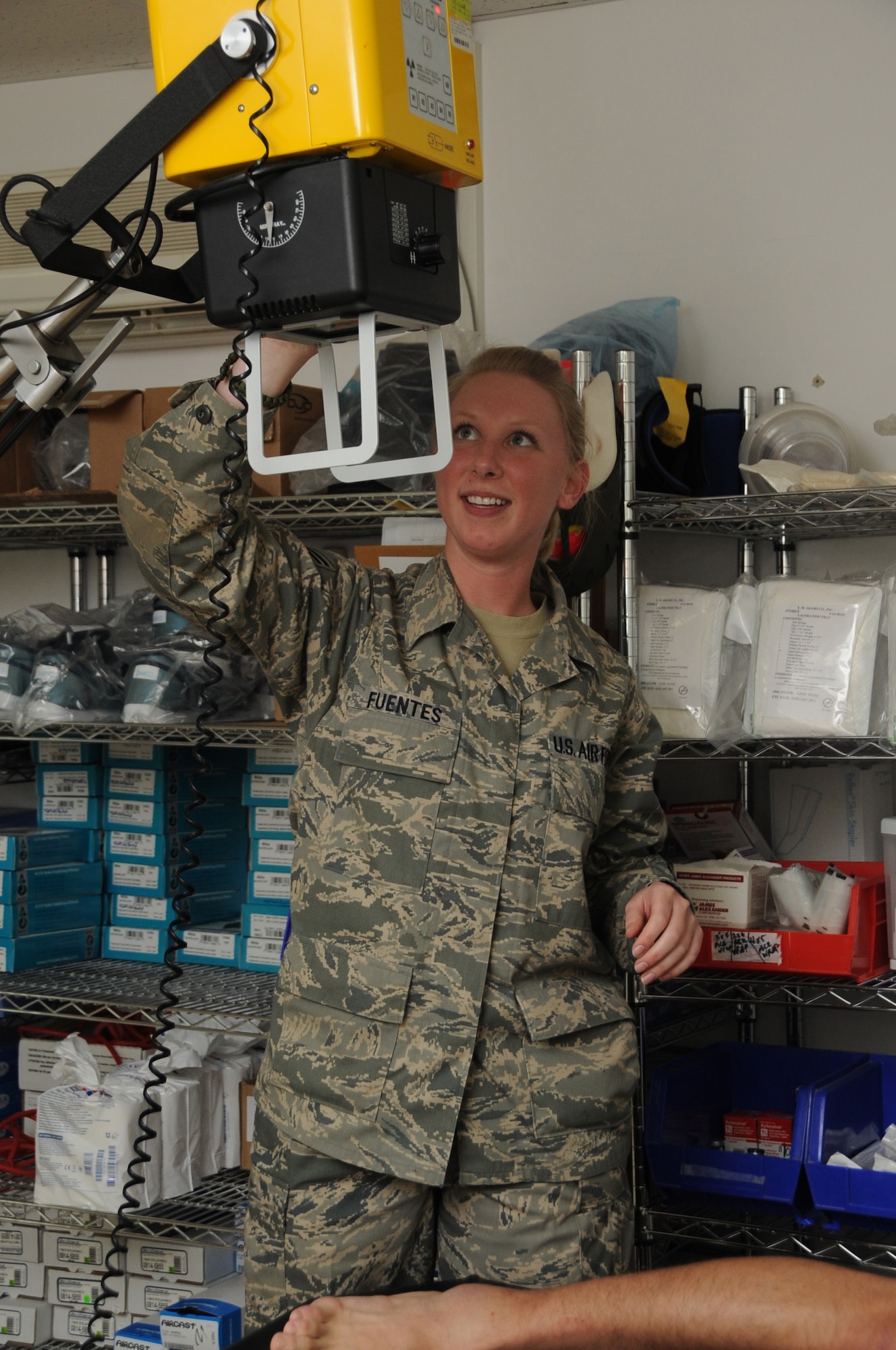 Senior Airman Shara Fuentes, 380th Expeditionary Medical Group aerospace medical technician, prepares to x-ray an ankle in the medical clinic at a non-disclosed location in Southwest Asia on Feb 15, 2010. The 380th EMDG is part of the 380th Air Expeditionary Wing that is comprised of four groups and 12 squadrons and the wing's deployed mission includes air refueling, surveillance, and reconnaissance in support of overseas contingency operations in Southwest Asia. The wing supports Operation Iraqi Freedom, Operation Enduring Freedom and the Combined Joint Task Force-Horn of Africa. Airman Fuentes is deployed from the 779th Medical Group at Andrews AFB, Md., and her hometown is Houston, Texas.(U.S. Air Force photo/Senior Airman Jenifer H. Calhoun/Released)
